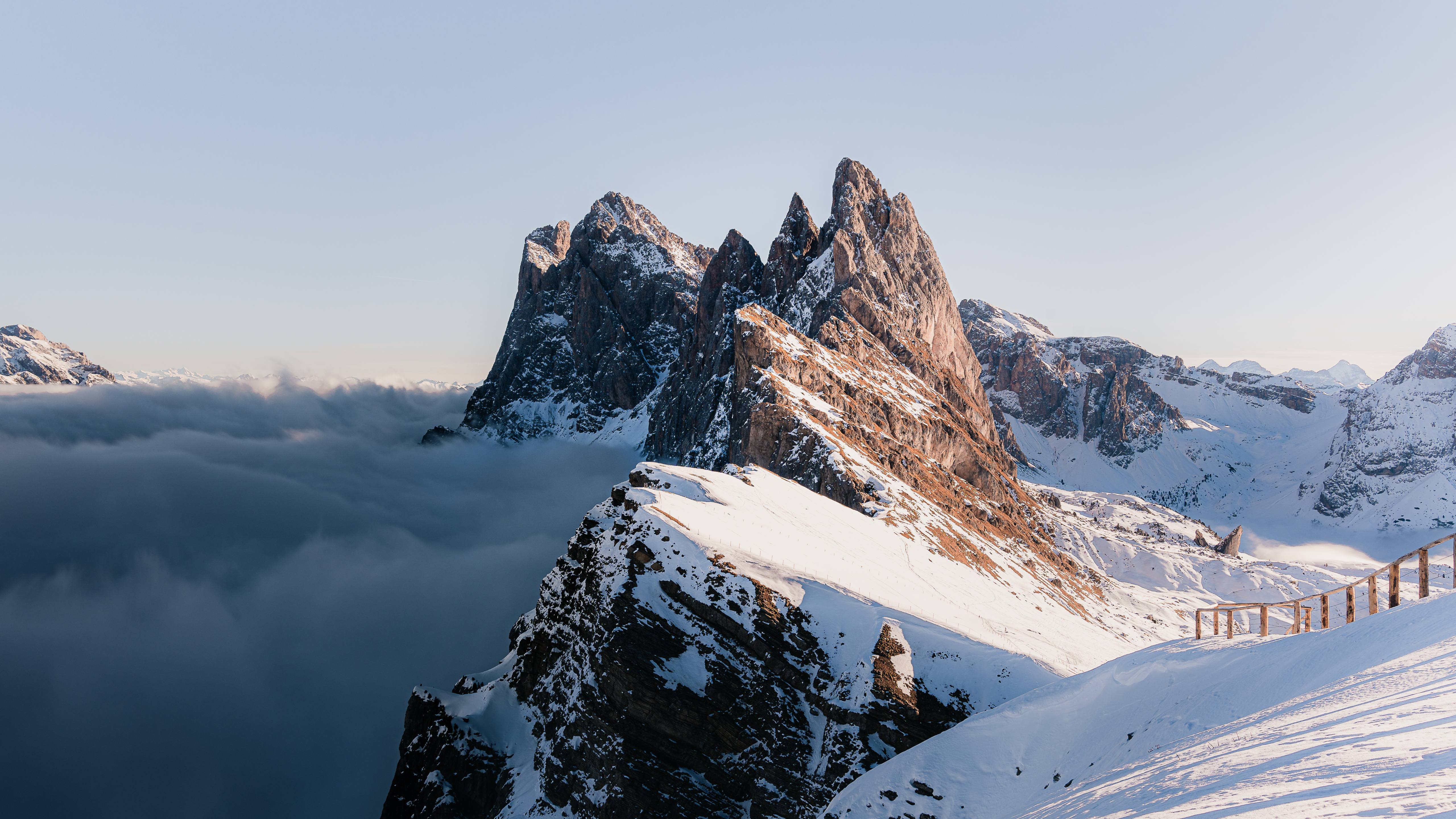Free download Nature Landscape Mountains Snow Clouds Sky Fence Rocks Winter 4K Wallpaper, Wallpaper(s) website provided.