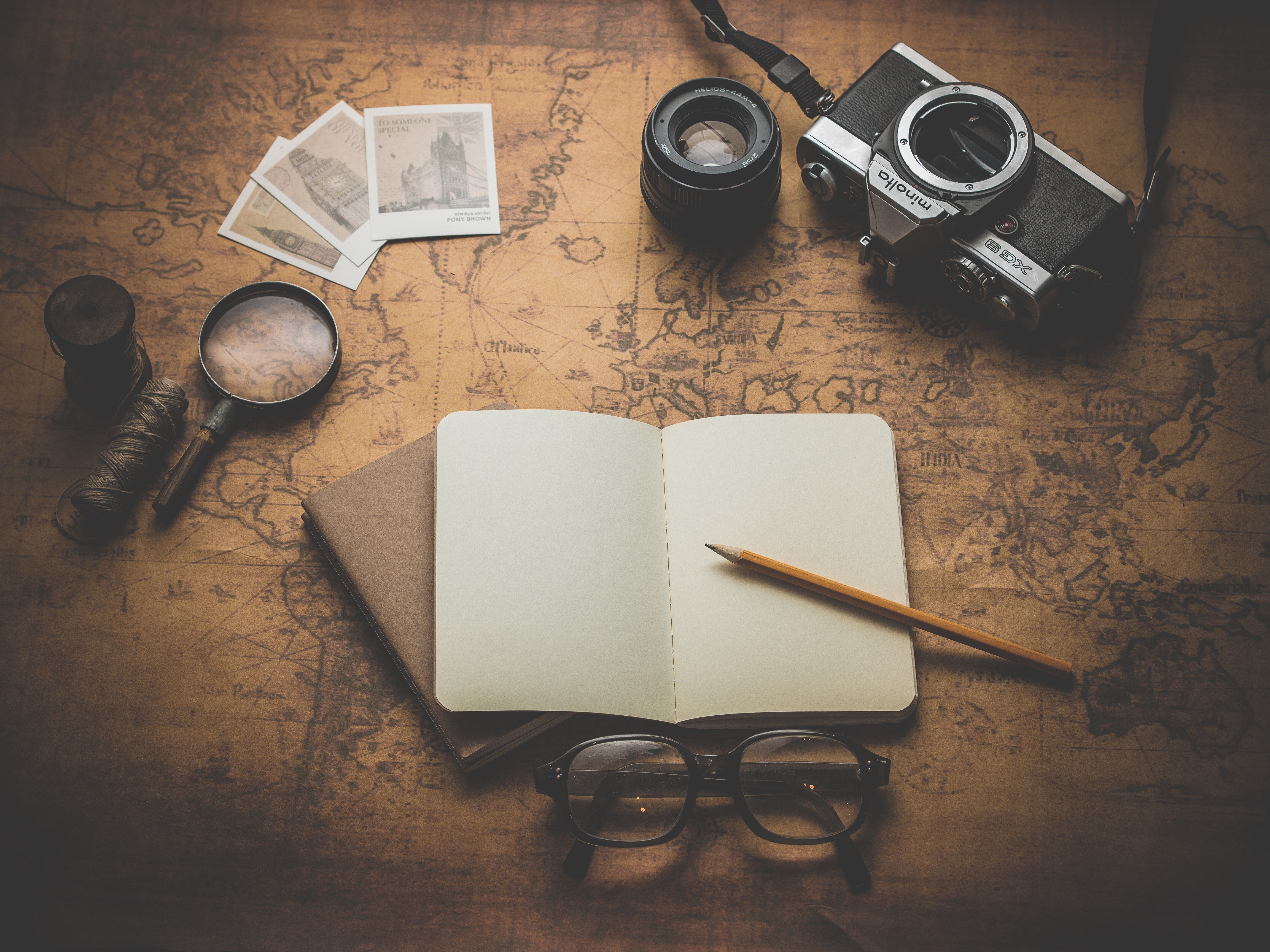 Free download Camera Map Minimalism Glasses Pencil Notebook 4K Wallpaper, Wallpaper(s) website provided.