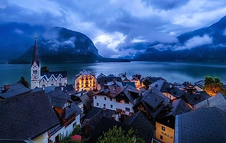 Free download houses church buildings village mountains evening lake clouds light landscape nature mist roof hotel idyllic town 4K wallpaper, Wallpaper(s) website provided.