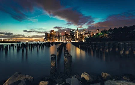 Free download Photography Cityscape Sunset City Promenade Skyscraper Water Sea Clouds Sunset Glow Sky Rock City Lights 4K Wallpaper, Wallpaper & 7wallpaper