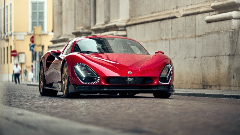Free download Alfa Romeo 33 Stradale Supercar Red cars Cobblestone street 5K, Wallpaper(s) website provided.